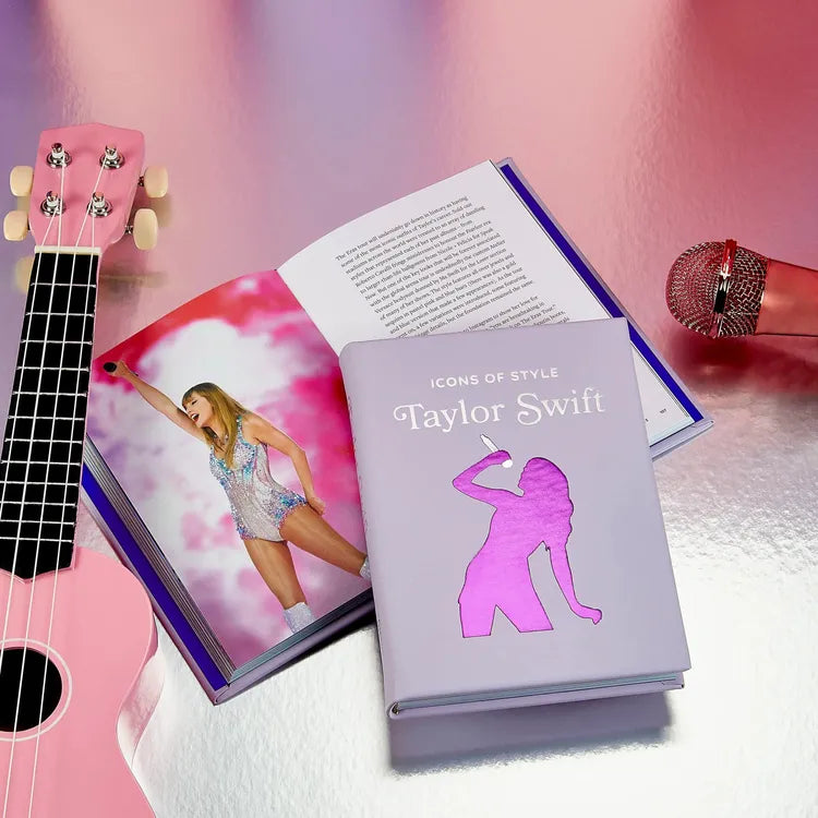 “Icons of Style: Taylor Swift” Book in Lilac Bonded Leather - FAO Schwarz